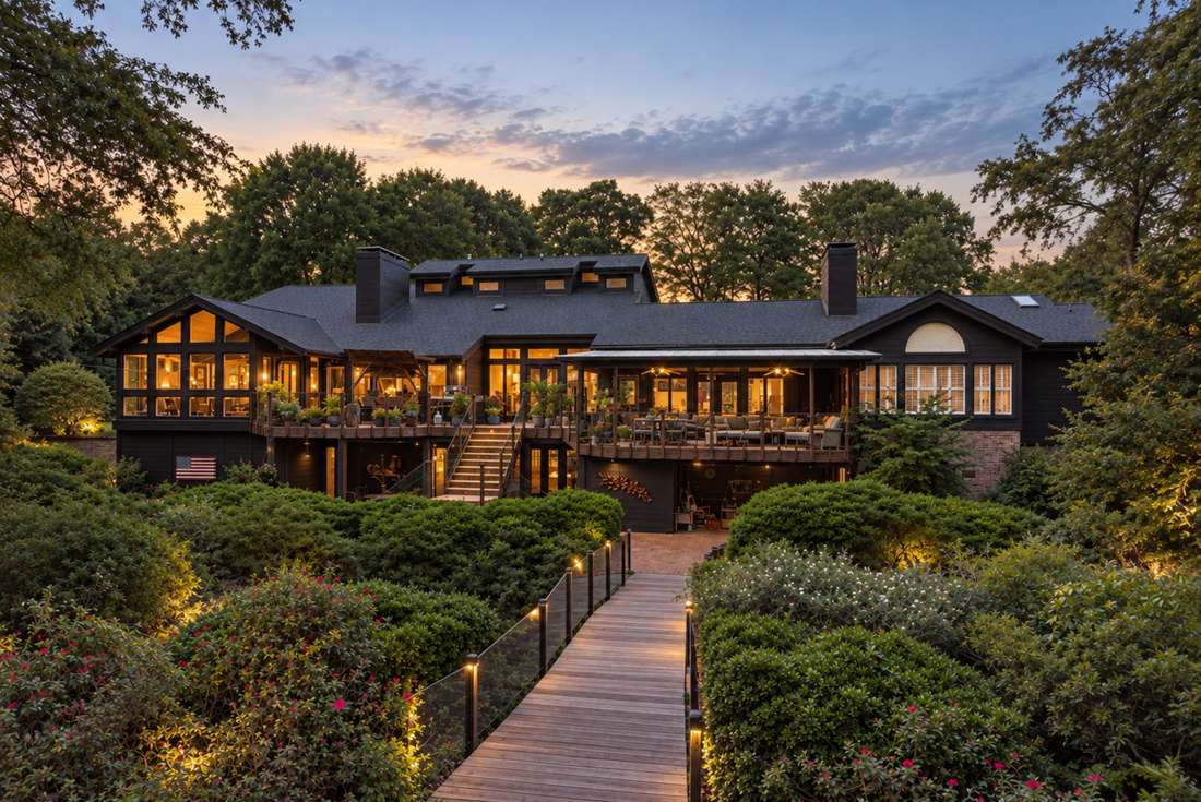 Rear elevation at twilight, lit walkway
